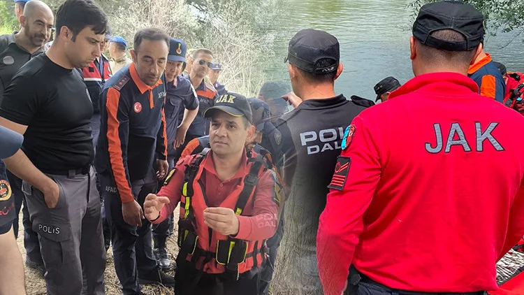 Çocuğunu kurtarmaya çalışırken hayatını kaybetti